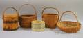 Three Woven Open Baskets a Blue Spongeware Butter Crock and a Wooden Firkin