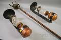 Pair of Dressler Metal Kerosene Wall Sconces and a Tin ThreeLight Gimbal Lamp on Wooden Handle