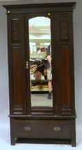 Late Victorian Walnutfinished Carved Wood and Mirrored Armoire with Long Drawer