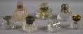 Seven Colorless Cut Glass Inkwells