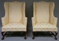 Pair of Chippendalestyle Ivory Damask Upholstered Mahoganyfinished Carved Wood Wing Chairs