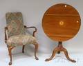 Chippendalestyle Inlaid Mahogany Tilttop Tea Table and a Queen Anne Style Upholstered Carved Walnut Armchair