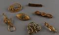Seven Antique Gold and Gilt Brooches