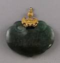 Carved Jade and Goldtone Pendant