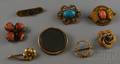 Eight Antique Gold and Gilt Brooches