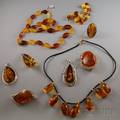 Nine Pieces of Russian Sterling Silver and Amber Jewelry