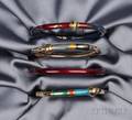 Four 18kt Gold Sterling Silver and Enamel Bangle Bracelets La Nouvelle Bague