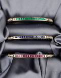Set of Three 18kt Gold Diamond and Gemset Bangle Bracelets