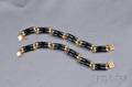Pair of 14kt Gold and Onyx Bracelets Gumps