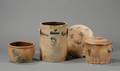 Three Cobaltdecorated Stoneware Crocks and a Cover