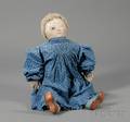 Folk Art Doll Wearing a Blue Dress and Shoes
