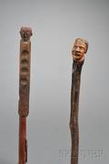 Two Carved and Painted Walking Sticks with Head Finials
