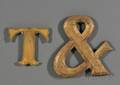 Gilded Letter T and an Ampersand