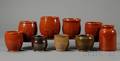 Eight Redware Jars and a Stoneware Jar