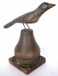 Folk art carved and painted bird on stand 20th c