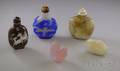 Four Asian Hardstone Items and a Black Porcelain Snuff Bottle