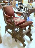 Empire Cast Ironmounted and Upholstered Carved Walnut Mechanical Barber Chair with Footrest