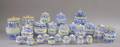 Twentyfour German Blue and White Stencil Decorated Ceramic Kitchen Cannisters