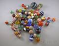 Approximately Twenty Glass and Clay Marbles