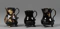 Three Staffordshire Jackfield Black Glazed Cream Jugs