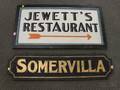Gilt and Blackpainted Wooden Somervilla Sign and a Vintage Painted Wooden Doublesided Jewetts Restaurant Sign