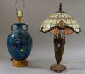 Mottled Blue Glazed Earthenware BottleTable Lamp Base and a Patinated Cast Metal Table Lamp with Leaded Art Glass Dome Shade