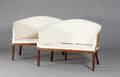 Pair of Federal Mahogany Upholstered Carved Settees