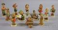 Twelve Hummel and Goebel Ceramic Figures