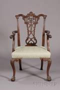 Chippendalestyle Carved Mahogany Open Armchair