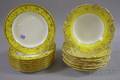 Two Sets of Mintons Gilt and Yellow Banded Porcelain Dinnerware