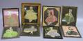 Fifteen Framed Cloth and Paper Doll Figures