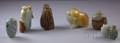 Six Carved Jade and Stone Snuff Bottles