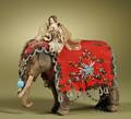 China Doll with Wood Body Riding an Elephant