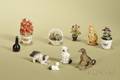 Group of Nine Miniature Animals and Potted Flowers