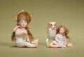 Two Bisque Children Figurines