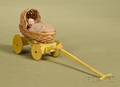 Small Doll and Dolls Carriage