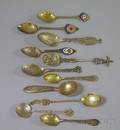 Eleven Sterling Silver and Silver Plate Souvenir Spoons