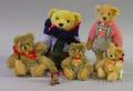 Five Steiff Bears and a Small Hedgehog Figure