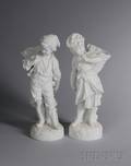 Pair of German White Bisque Figures of a Boy and Girl