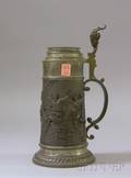 Late Victorian Pewter Lidded Tankard Decorated with Bacchanalian Scene in Relief