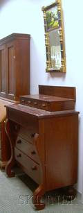Empire Mahogany Veneer Bureau and a PartEbonized Giltwood SplitBaluster Mirror with Reversepainted Glass Tablet