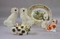 Five Staffordshire and Faience Figural Articles and a Staffordshire Transfer Landscape Decorated Platter