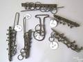 Six whimsical wrought iron puzzles 19th c