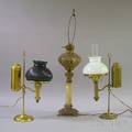 Two Brass Student Lamps and a Late Victorian Metal and Onyx Kerosene Banquet Lamp