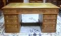 British Oak Doublepedestal Partners Desk with Tooled Leatherinset Writing Surface