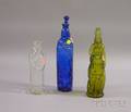 Three Molded Figural Glass Bottles