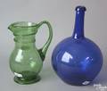Two pcs of glass to include a green blown glass pitcher