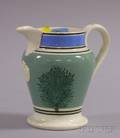 Seaweed Decorated Mochaware Footed Jug