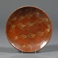 Redware Plate with Yellow Slip Bacon Strip Decoration