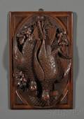 Two Reliefcarved Walnut Panels with Hanging Game and Fish